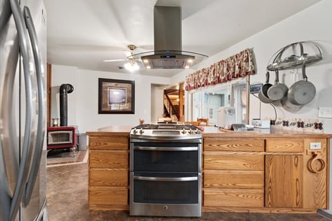 This kitchen is fully stocked with everything you need to cook-in.