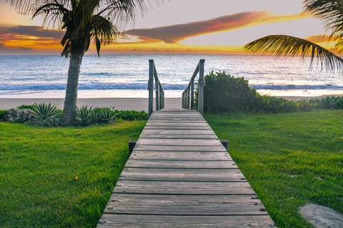 Beach nearby, white sand, beach towels