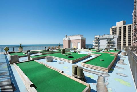 Play mini-golf on the rooftop with ocean breezes.