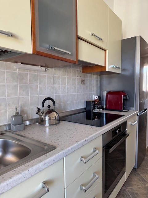 Comfort Condo, Sea View | Private kitchen | Espresso maker, electric kettle, toaster