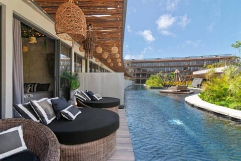 Enjoy exclusive poolside living with direct access to crystal-clear waters, comfortable daybeds, and beautifully landscaped surroundings designed for ultimate relaxation.