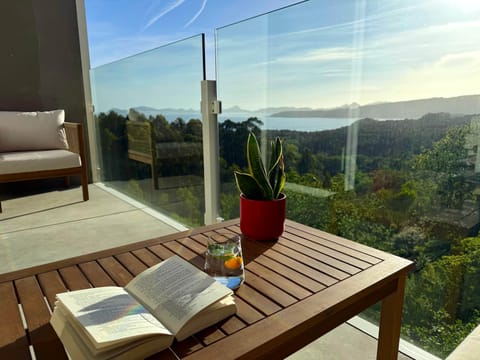 Intimate balcony corner for slow mornings and relaxed evenings.