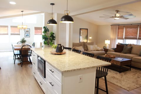 Kitchen looking into Living room and Dining Room