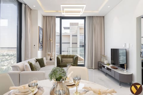 Luxury Apartment, Balcony, City View | Living area | 65-inch Smart TV with cable channels