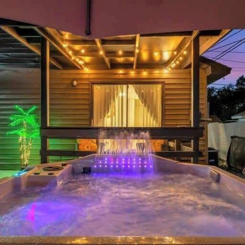 Unwind under the stars in your private, illuminated hot tub!