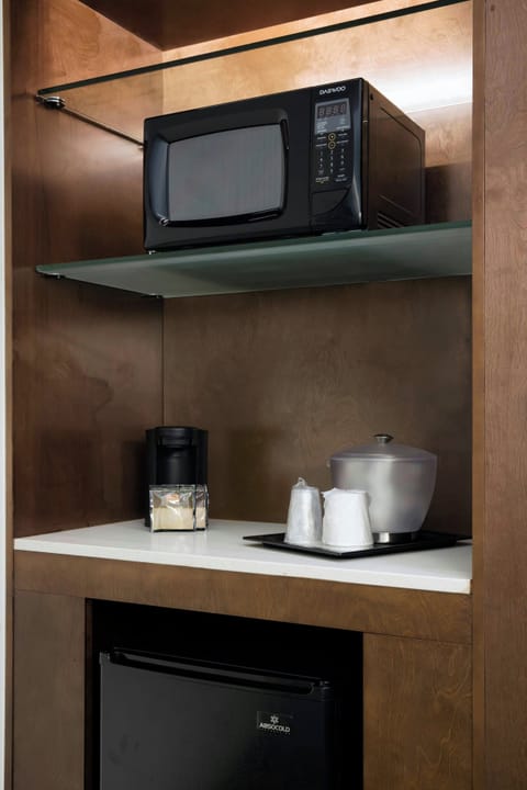 Premium bedding, desk, laptop workspace, iron/ironing board