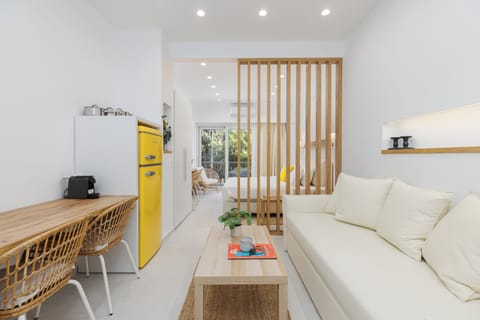 Superior Studio, Balcony, City View | Living area | Flat-screen TV