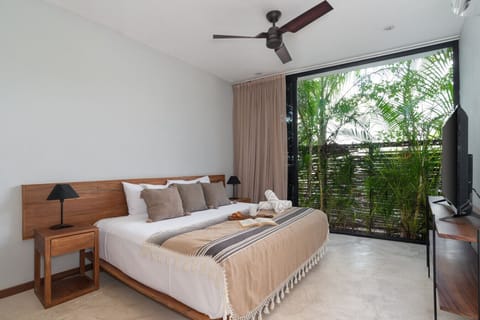 Comfortable king-size bed, perfect for relaxing and a restful sleep.