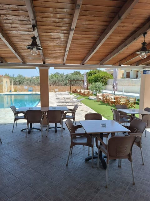 Seasonal outdoor pool, open 9:00 AM to 9:00 PM, sun loungers