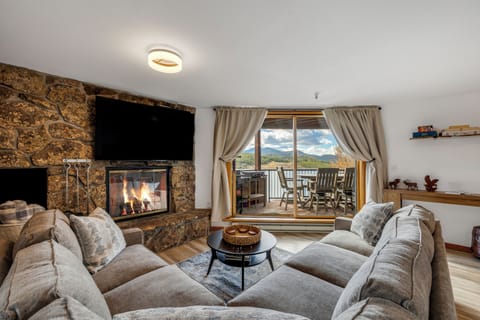 Living Room with Cozy Fireplace and Wonderful Views