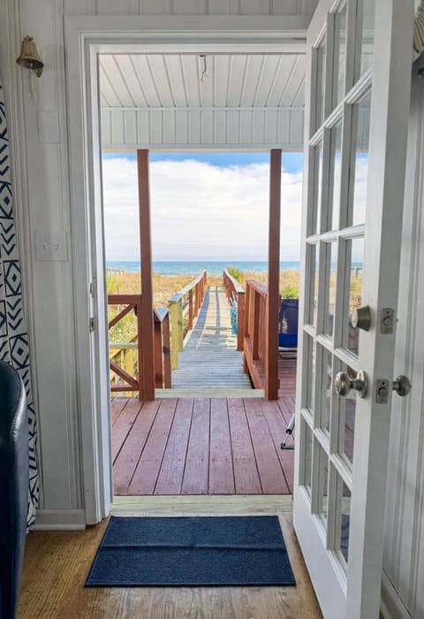 Private boardwalk from your Living Room straight to the sand!