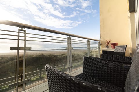 Side view of balcony and coastal setting