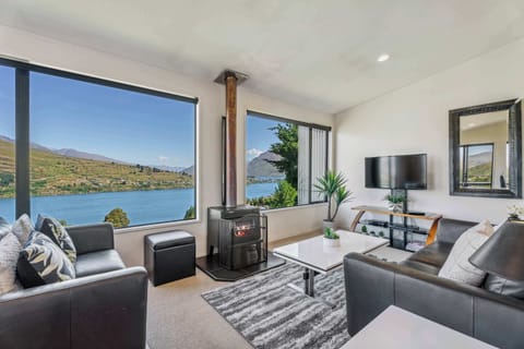 Gorgeous views from the very stylish living room.  Nice and cool in summer... and cozy warm in winter!