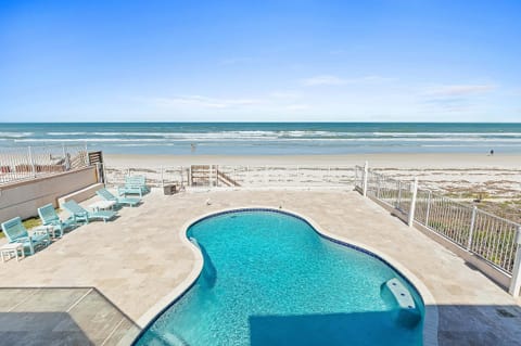 Incredible beach stay featuring a private oceanfront pool and direct access to the sand. Lounge poolside or enjoy the waves just steps away in this perfect seaside retreat.