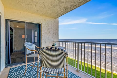 Relax on a private oceanfront balcony overlooking golden sand and rolling waves. Enjoy your beach stay with coastal breezes, outdoor seating, and front-row views of the shoreline—perfect for sunrise coffee or sunset relaxation.