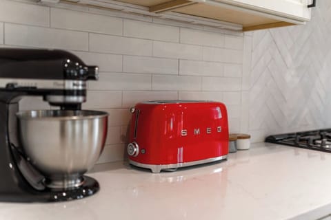 Italian Smeg toaster and KitchenAid mixer — perfect for your morning toast or baking inspiration. ✨