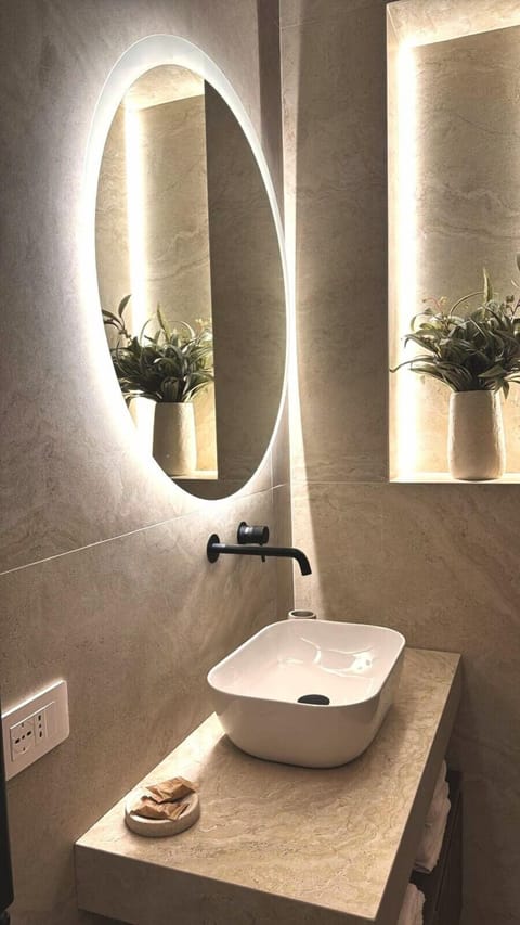 Luxury Quadruple Room, Balcony, City View | Bathroom | Shower, free toiletries, hair dryer, bathrobes