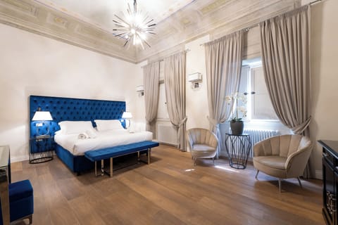 Deluxe Double or Twin Room, City View | In-room safe, desk, blackout drapes, iron/ironing board