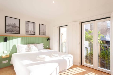Queen sized bed with aircon, bedside lamps, bedside table, plugs and usb connection. 
Both the double door and single door window open. 
Integrated wardrobes