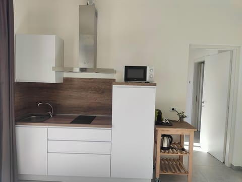 Fior di Loto | Private kitchen | Espresso maker, coffee/tea maker, electric kettle, dining tables