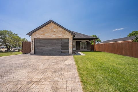 Two car garage in front of the house
