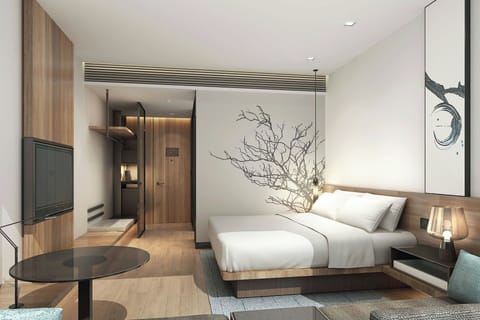 Standard Room, 1 Queen Bed | Free minibar, in-room safe, desk, laptop workspace