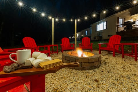 Enjoy unforgettable nights around the fire with cozy seating, string lights, and everything you need for the perfect s’mores experience.