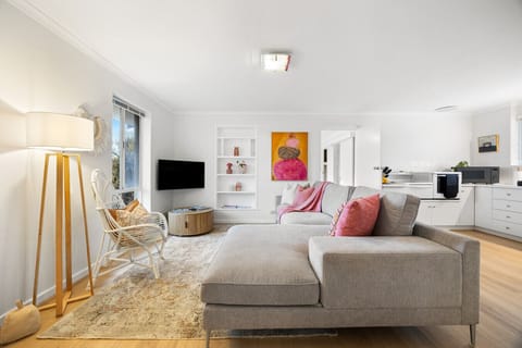 Gather for a movie night, a puzzle challenge, or a good book in the cosy, stylish living area.