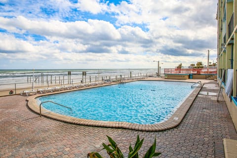 Enjoy the oceanfront swimming pool just steps from the sandy beach. Lounge poolside, soak up the sun, and experience the perfect blend of pool and ocean during your unforgettable beach stay.