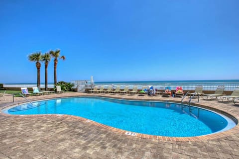 Soak up the sun during your beach stay at the oceanfront pool, featuring stunning coastal views and plenty of lounge seating. Just steps from the sand, this resort-style pool is perfect for relaxing, swimming, and enjoying seaside vibes.