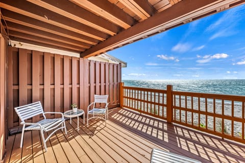 Step onto the semi-private deck and feel the gentle Gulf breeze, chaise lounges, and table inviting relaxation and calm.