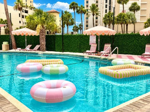 Outdoor pool, open 9:00 AM to 9:00 PM, pool umbrellas, sun loungers
