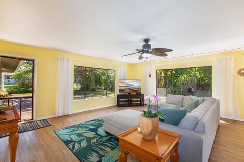 Relax indoors while enjoying the lush greenery