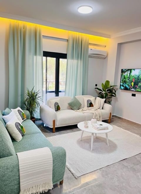 Deluxe Suite | Living area | 43-inch Smart TV with premium channels