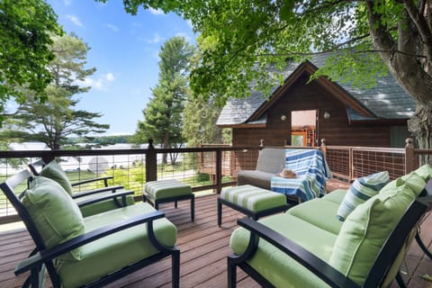 Here’s a polished version that fits beautifully with the joint-listing message:  Catch up with loved ones on the spacious1,250 sq ft deck overlooking Lake Ann — the perfect setting for laughter, long conversations, and the moments you’ll remember most.