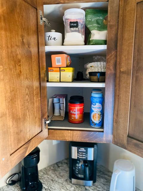 Complimentary beverages in kitchen cabinet