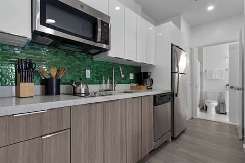 1 Bedroom with Window & Balcony | Private kitchen | Mini-fridge, microwave, stovetop, cookware/dishes/utensils