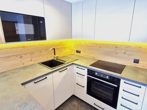 Flooring, Wood, Floor, Countertop, Wood Stain, Wood Flooring, Kitchen, Kitchen Appliance, Hardwood, Cabinetry