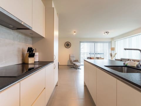 Kitchen, Countertop, Interior Design, Flooring, Wood, Floor, Cabinetry, Ceiling, Kitchen Appliance, Light Fixture