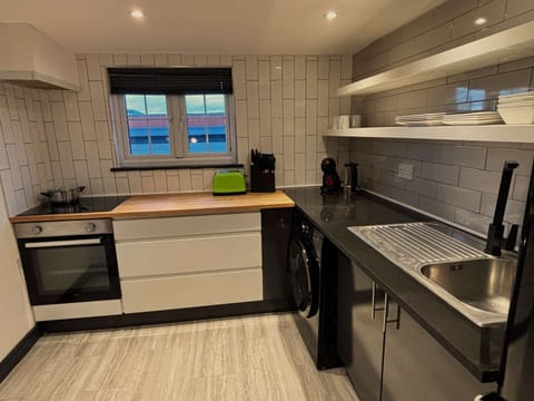 Full Kitchen with cooking utensils and cookware to create the perfect snack or meal