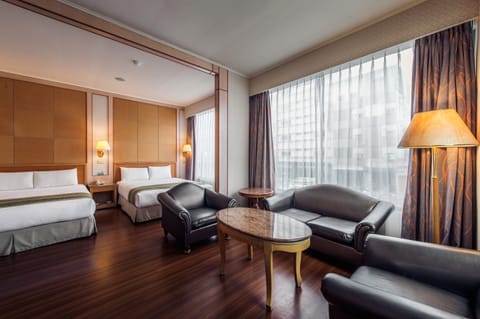 Deluxe Quadruple Room | Premium bedding, free minibar, desk, blackout drapes
