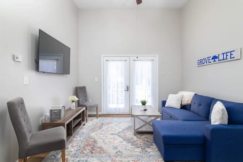 Living Area - Convertible sectional (pulls out into small bed) and we can leave extra bedding (one pillow, a flat sheet, and a blanket) in the chaise storage compartment.