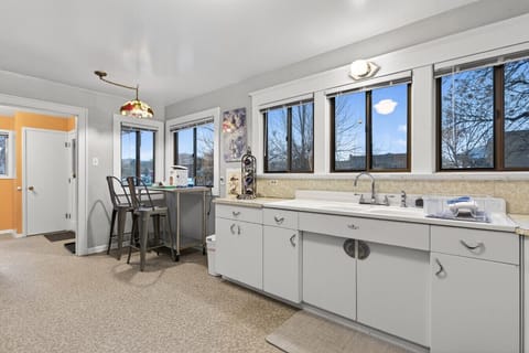 You will love all of the natural light in this large kitchen.