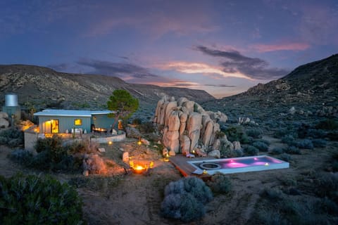 Spa + pool carved into boulders (heated)