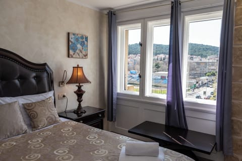 Deluxe Double Room, City View | In-room safe, iron/ironing board, free WiFi