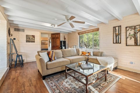 Warm and inviting living room with exposed brick walls.