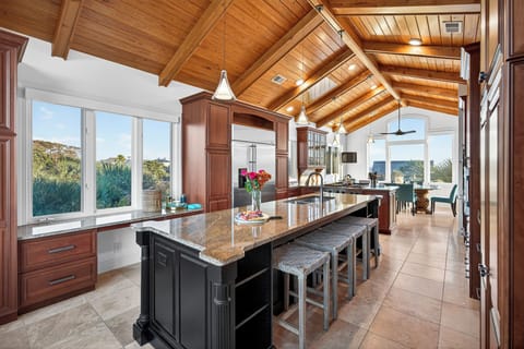 Plenty of additional bar stools to sit and conversate while you cook a delicious meal