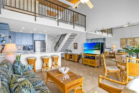 The kitchen, living room, and the bonus loft area all connect seamlessly, making it easy for everyone to hang out together in comfort and style.