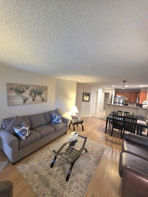 Unit A. The view from executive living room thru kitchen w/ queen pullout sofa.