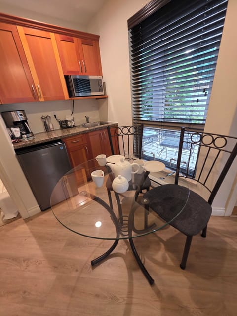 The roomiest Kitchenette with microwave and modern bar fridge.